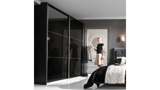 Готові шафи-купе для вітальні і залу: переваги та особливості вибору меблів